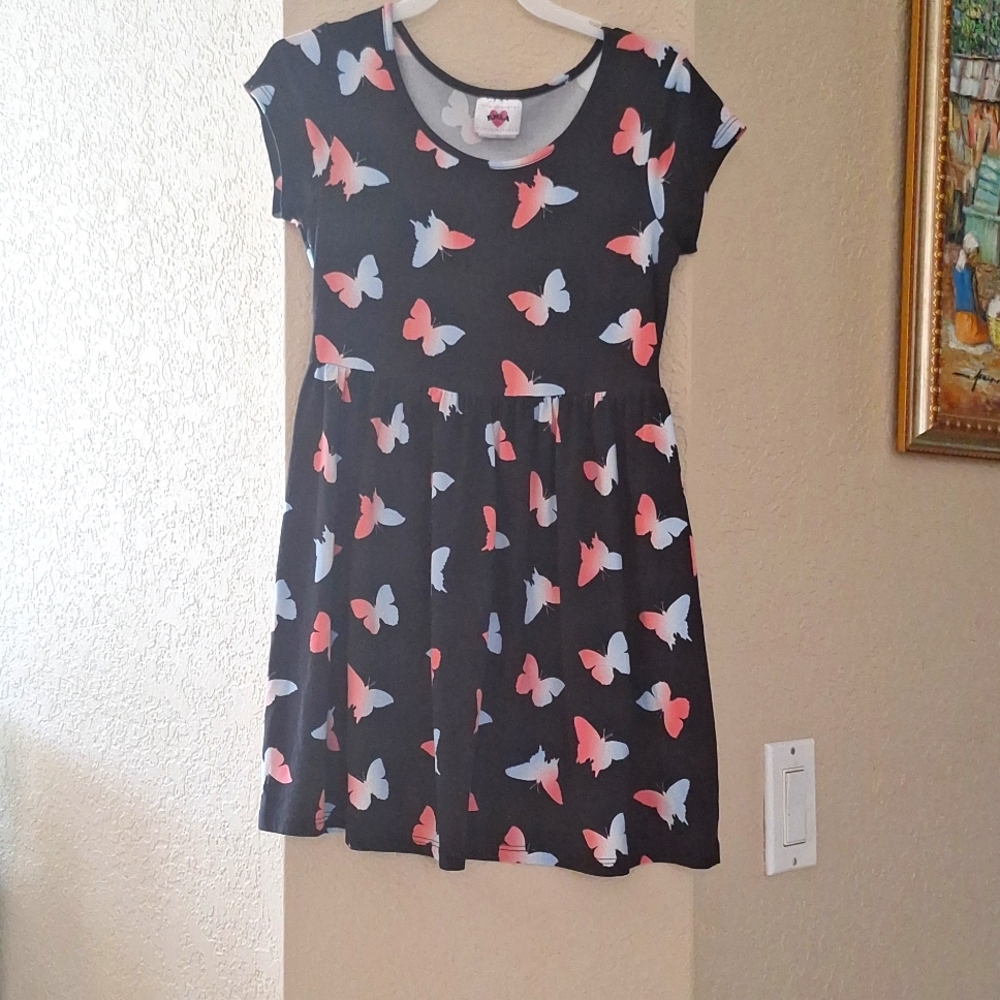 A black dress with pink and blue butterflies